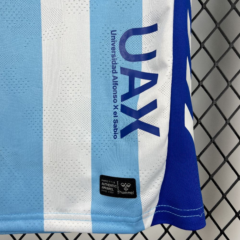 Malaga 2025/26 Conjunto Principal – Criança