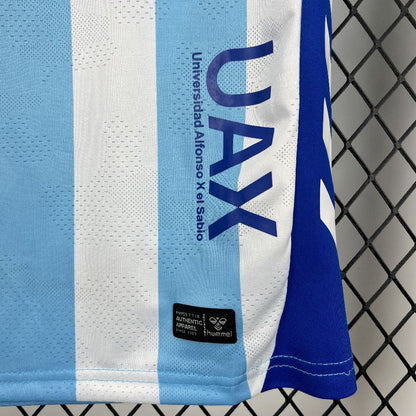 Malaga 2025/26 Conjunto Principal – Criança